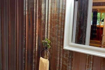 a sink sitting under a window