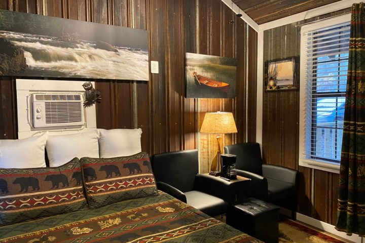 a room filled with furniture and a large window