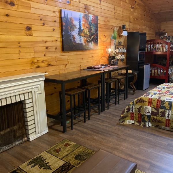 a living room filled with furniture and a fireplace