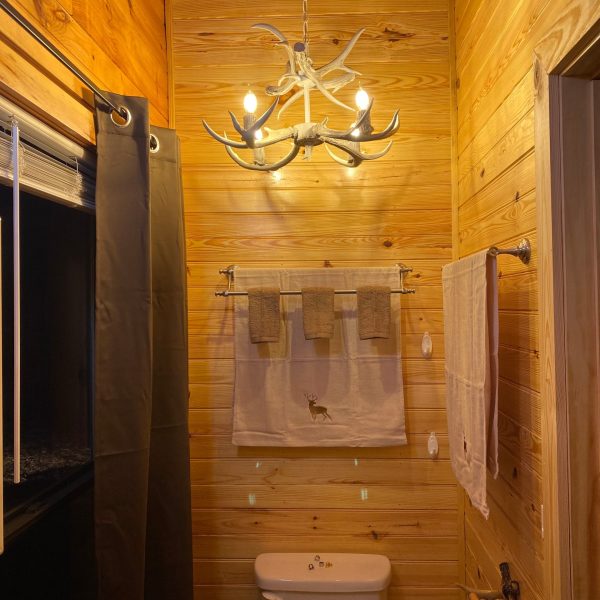 a room with a sink and a mirror