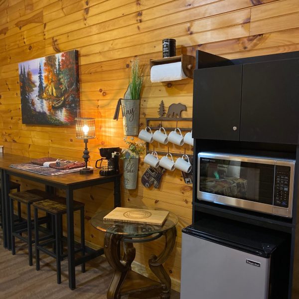 a living room filled with furniture and a tv