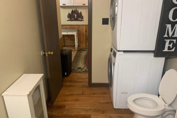 a sign on the side of a sink